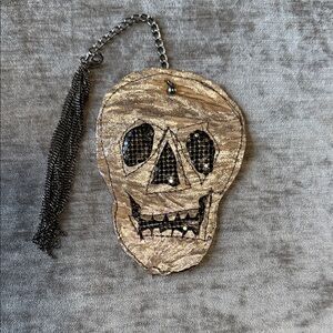 Gold Skull Pendant with Black Accents